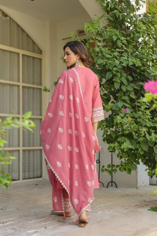 Elegant dobby cotton designer suit attached inner embellished with beautiful embroidery & lace work paired with embroidered pants & dupatta